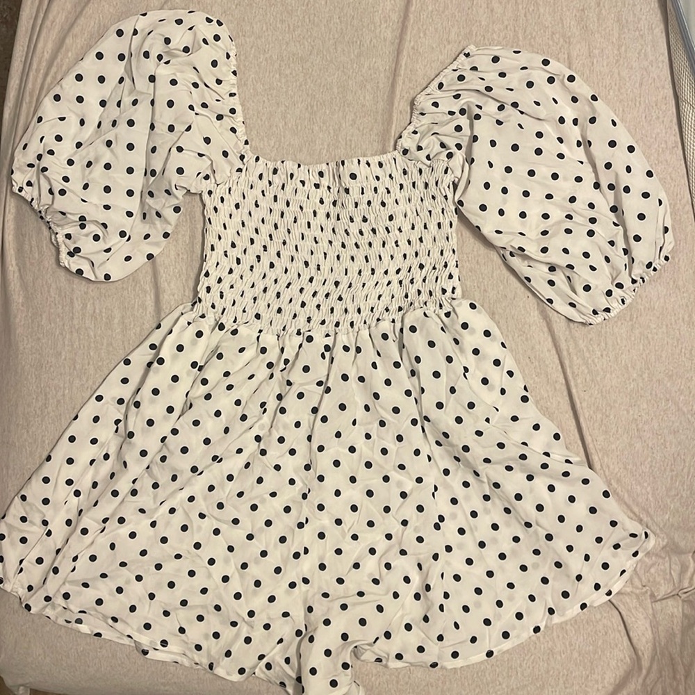 Super cute black and white polkadot romper size large.